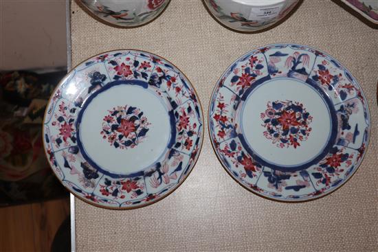 A pair of 19th century Chinese famille rose jardinieres, an 18th century Chinese famille dish and three plates